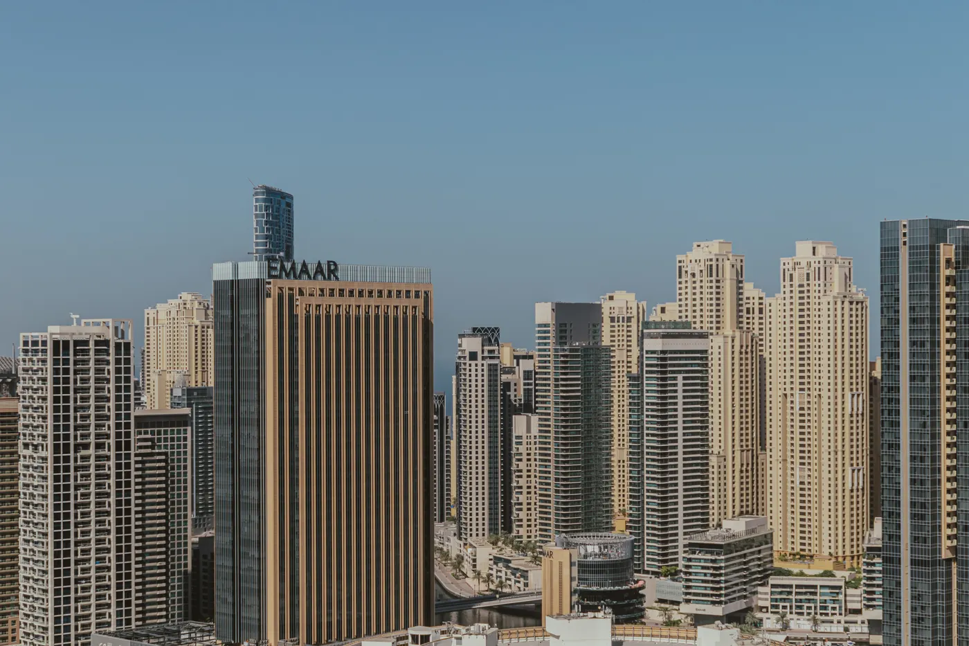A stunning view of the modern skyscrapers in Dubai's skyline on a clear day.